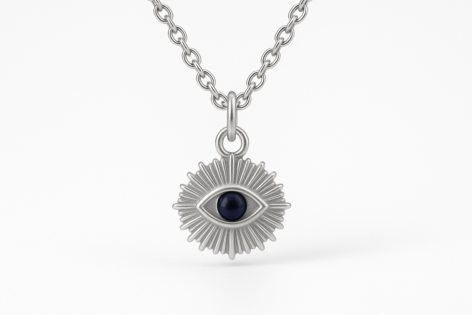EVIL EYE SUN CHARM - Sterling Silver with white backdrop
