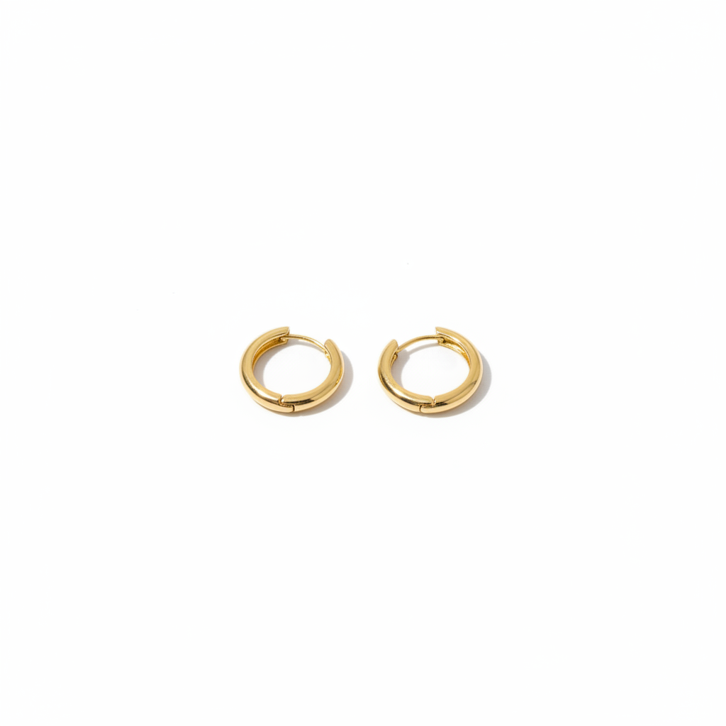 Gold Huggie Hoop Earrings on White Background