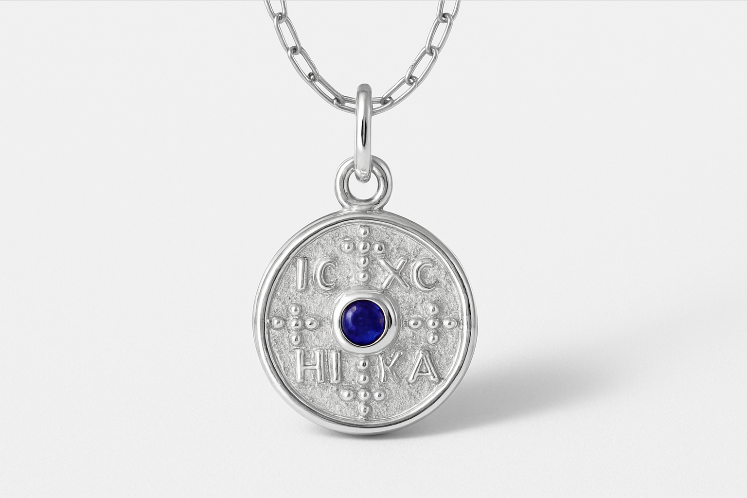 HIEROGLYPH CHARM - Sterling Silver with white backdrop