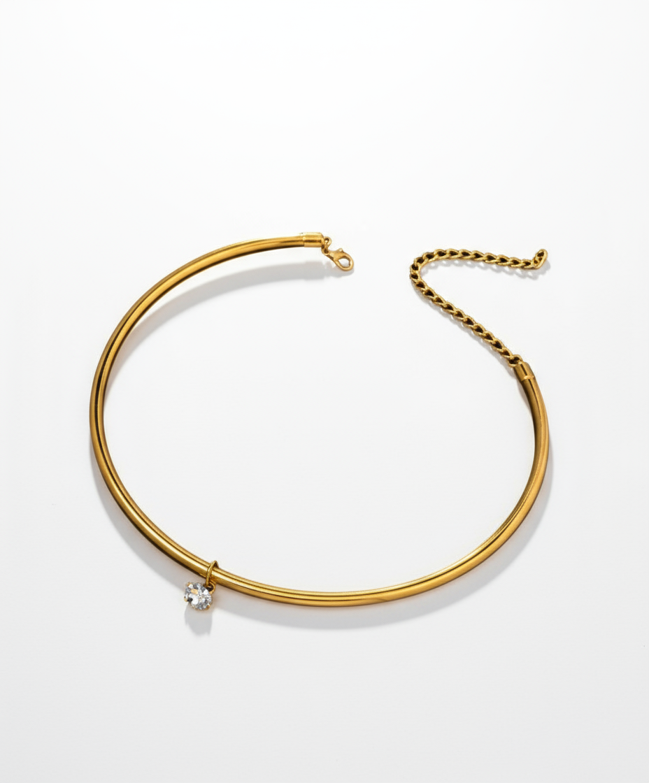 Professional studio backdrop for gold choker necklace with crystal charm