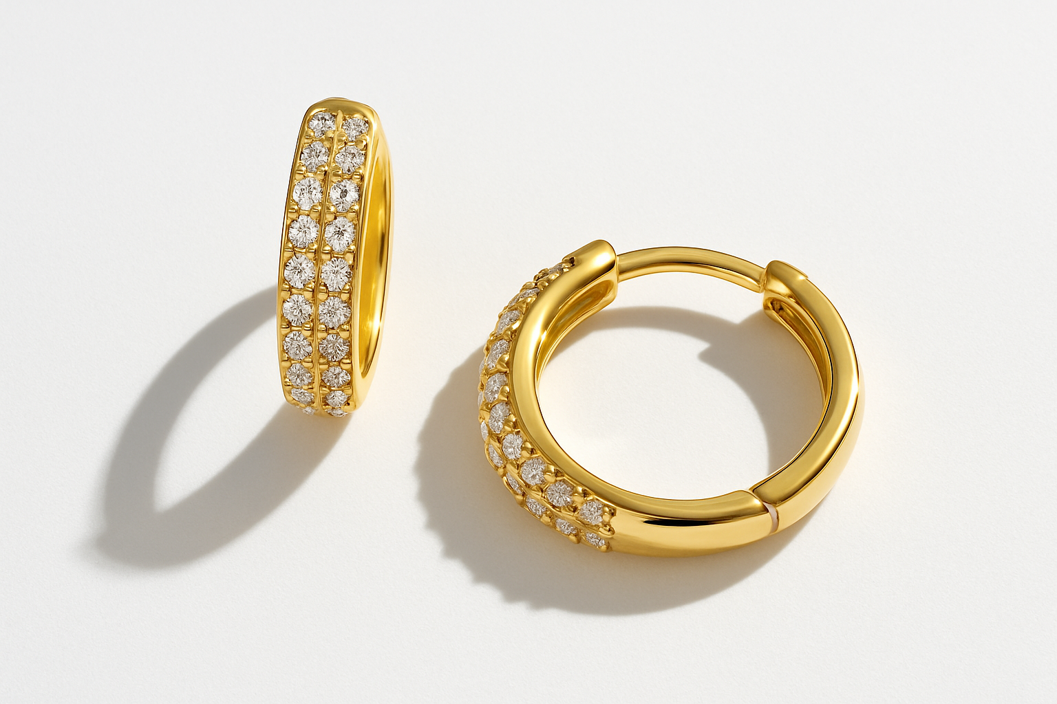 Updated flatlay image of CAMILLA HOOPS with white backdrop and flash shadows